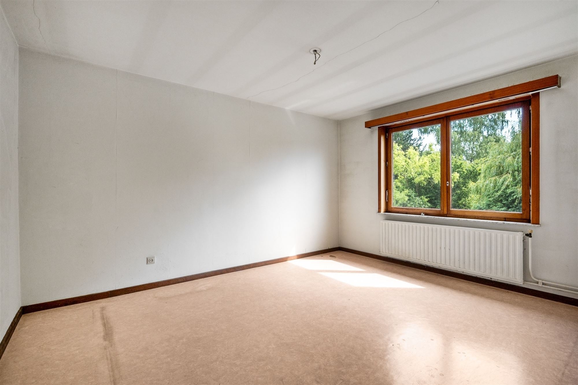 Woning met veel potentieel om een uitstekende locatie te Walem