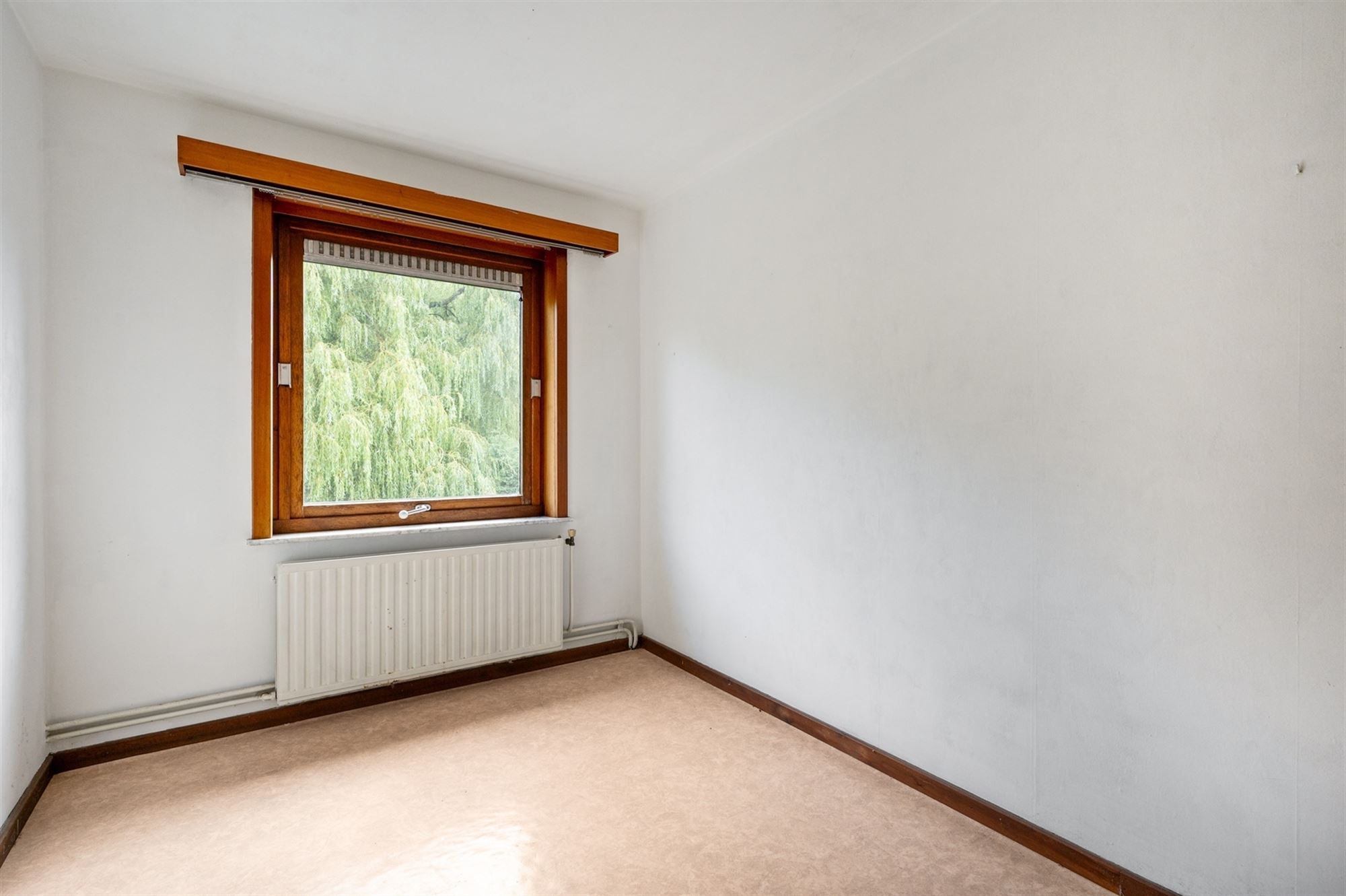Woning met veel potentieel om een uitstekende locatie te Walem