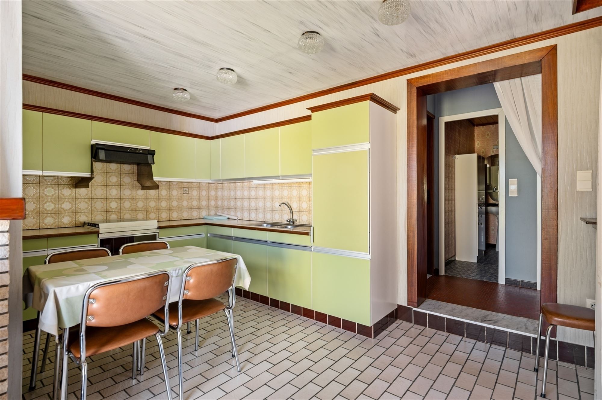 Bouwgrond met af te breken of grondig te moderniseren woning te Putte