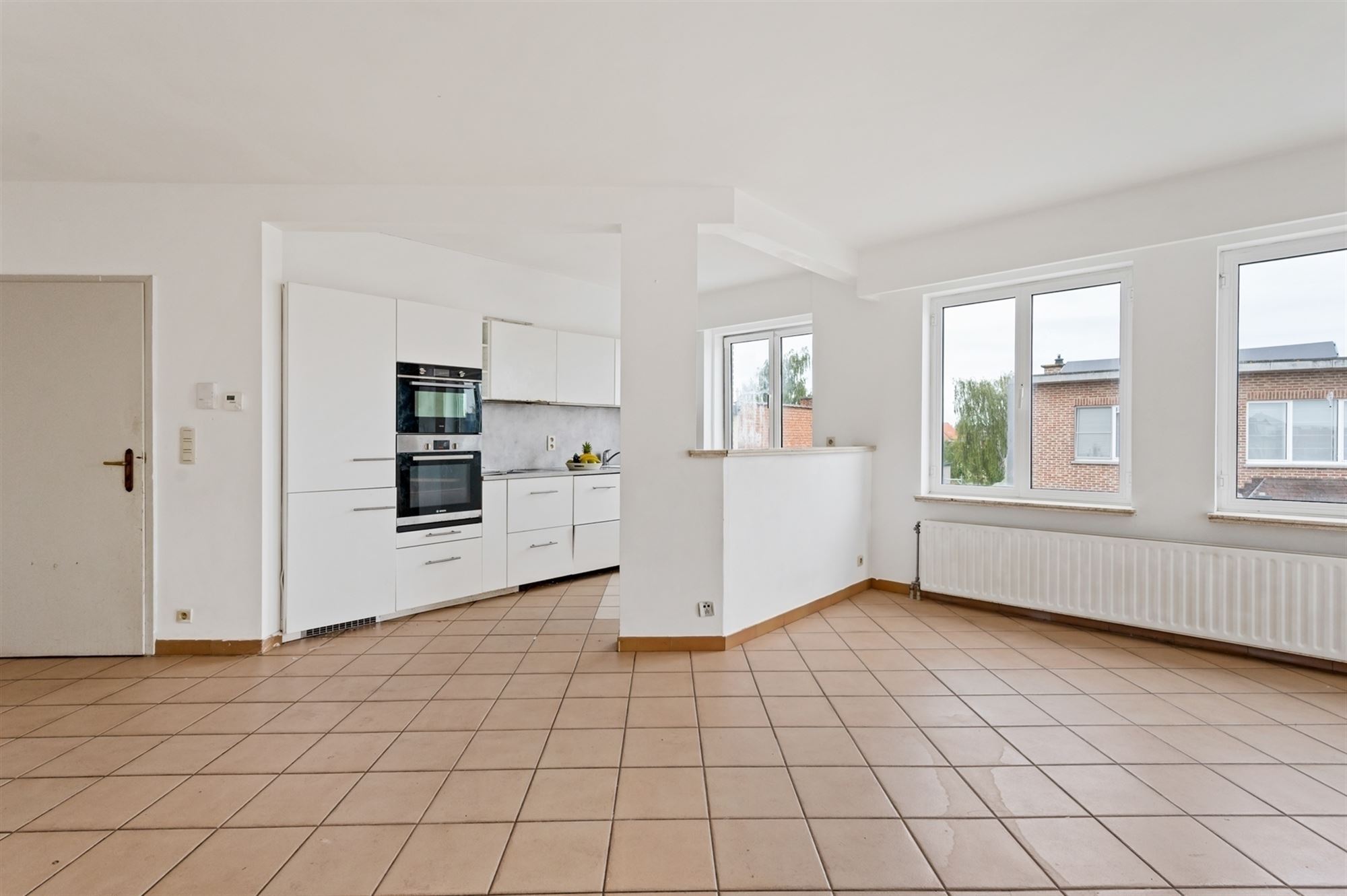 Opbrengsteigendom - 2 appartementen + handelspand te Lier