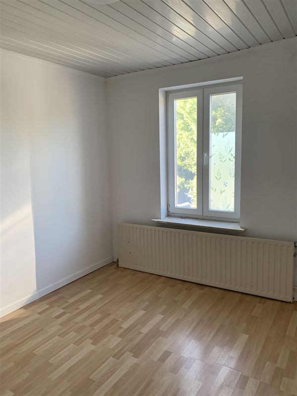 Rijwoning met koer