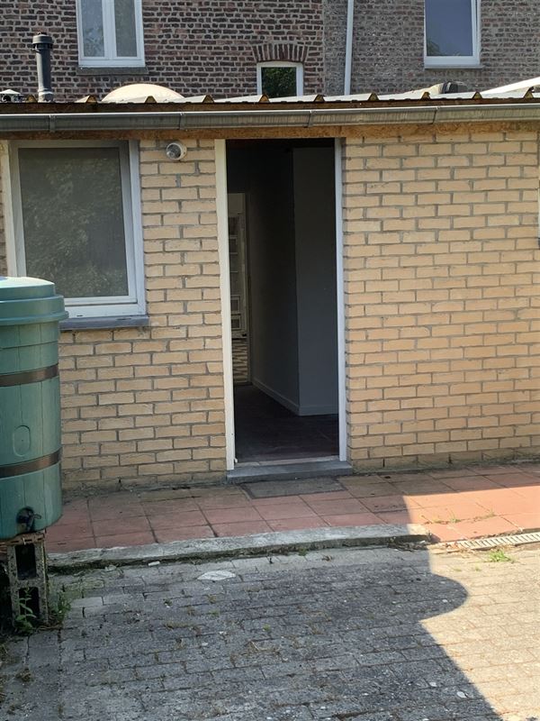 Rijwoning met koer