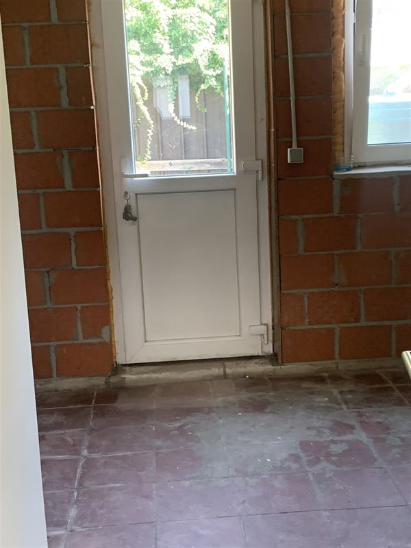Rijwoning met koer