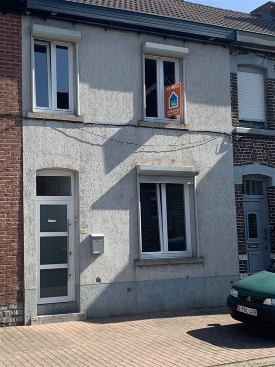 Rijwoning met koer