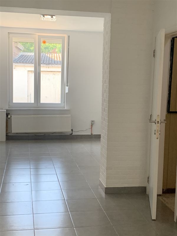 Rijwoning met koer