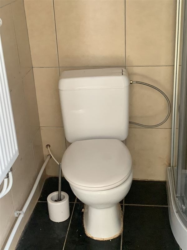 Rijwoning met koer