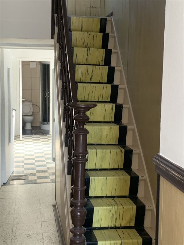 Rijwoning met koer