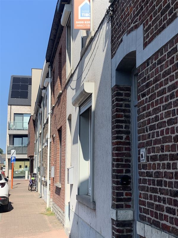Rijwoning met koer