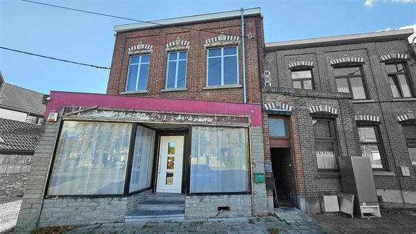 Commerce + logement et jardin