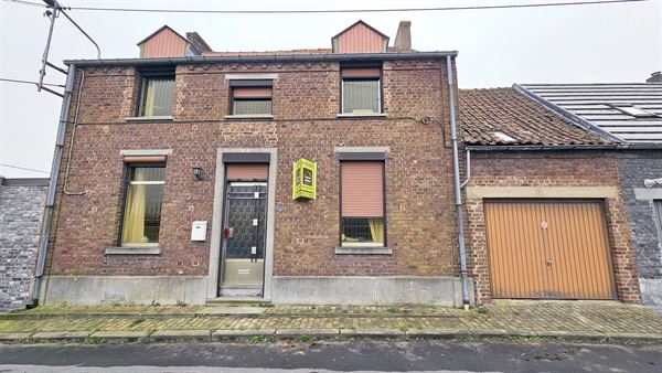 Maison à restaurer + garage et jardin