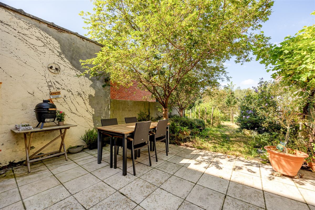 Gezinswoning met vier slaapkamers en tuin