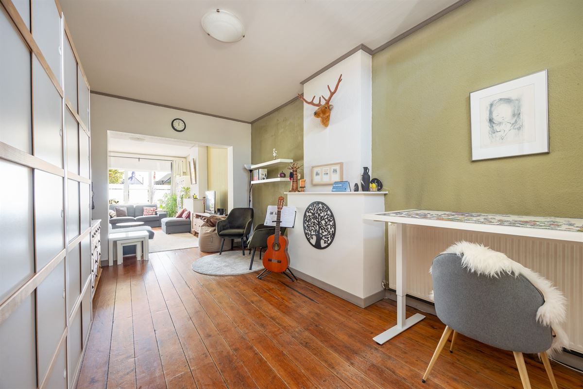 Gezinswoning met vier slaapkamers en tuin