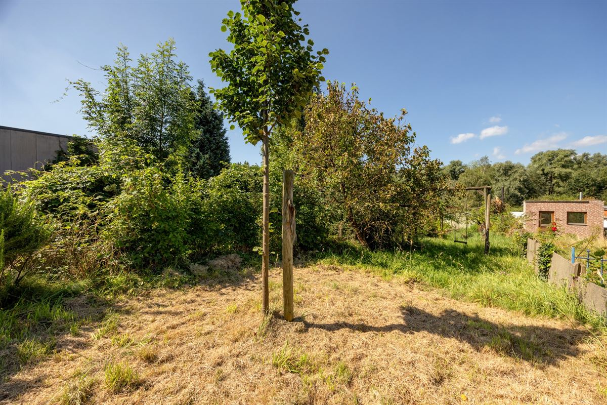 Gezinswoning met vier slaapkamers en tuin