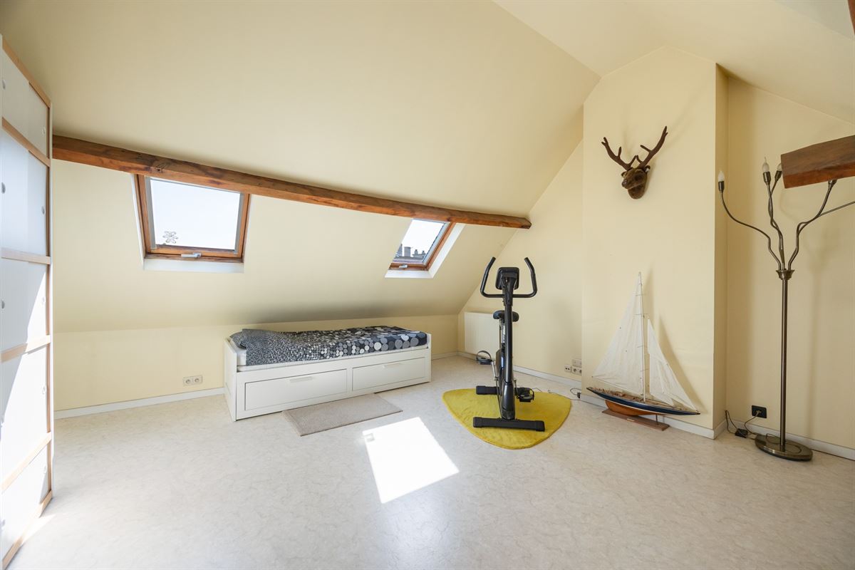 Gezinswoning met vier slaapkamers en tuin
