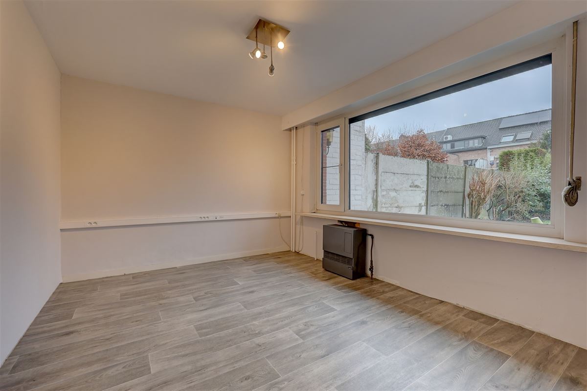 Ruime woning met 4 slpk, W-tuin en garage