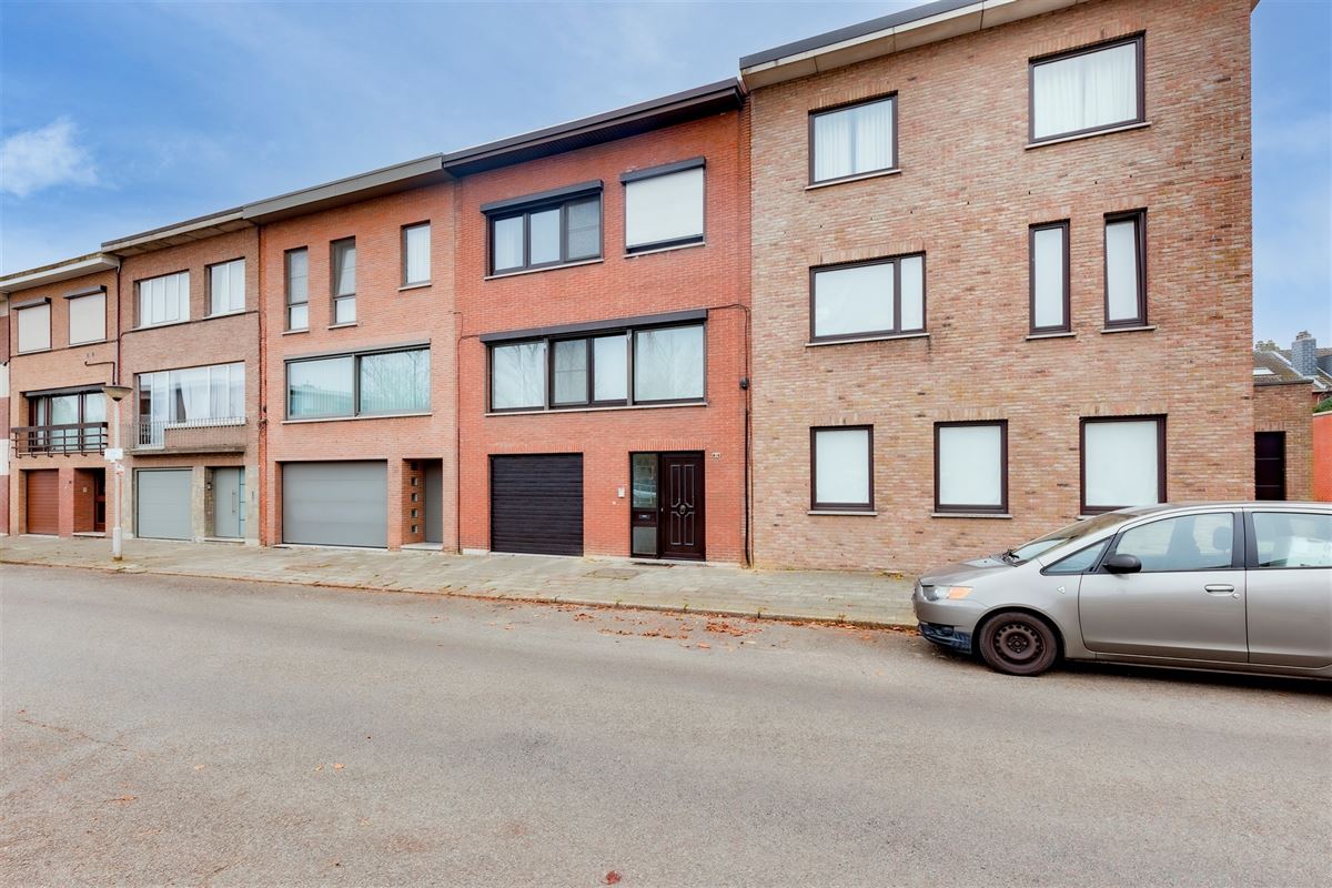 Ruime woning met 4 slpk, W-tuin en garage
