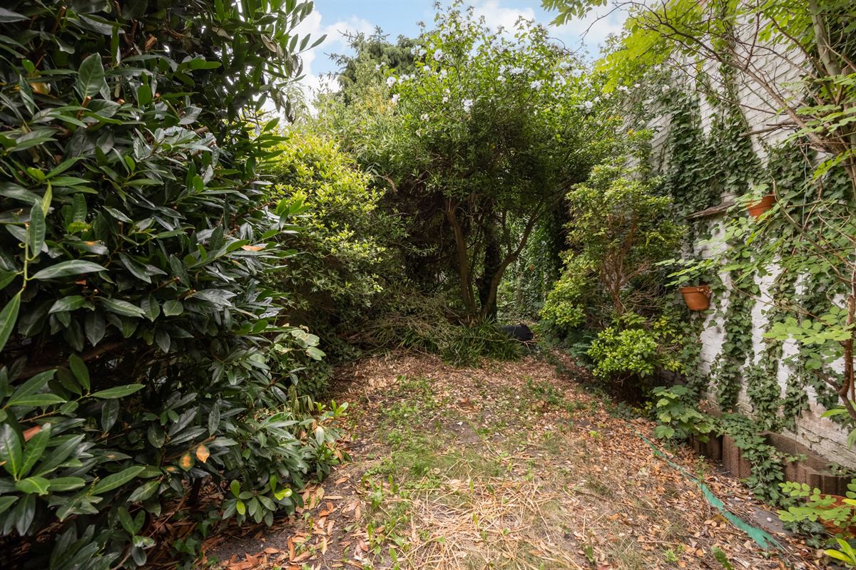 Te renoveren woning met tuin op toplocatie in Mechelen
