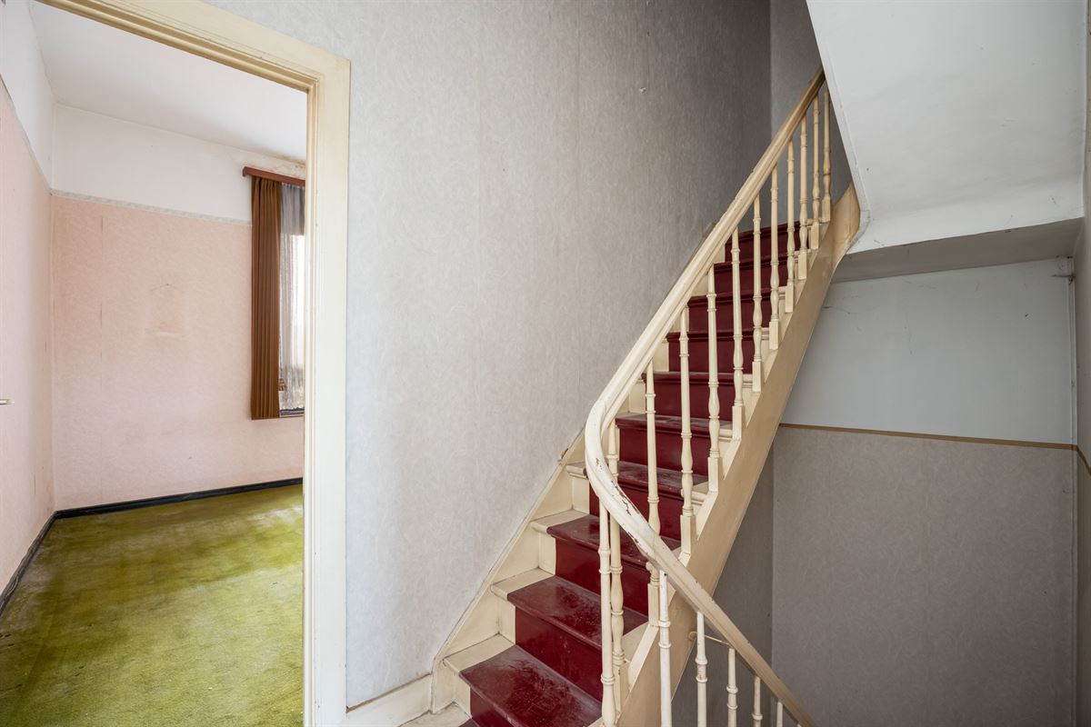 Te renoveren woning met tuin op toplocatie in Mechelen