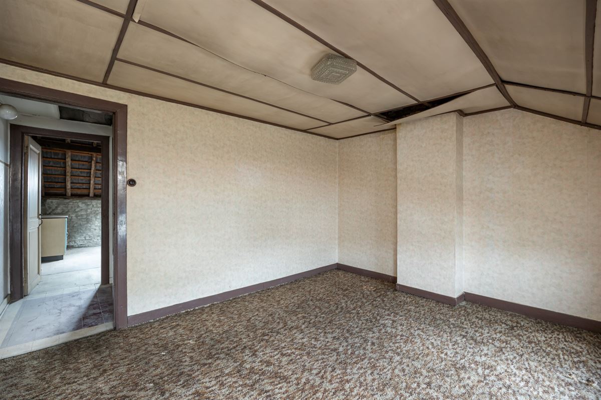 Te renoveren woning met tuin op toplocatie in Mechelen