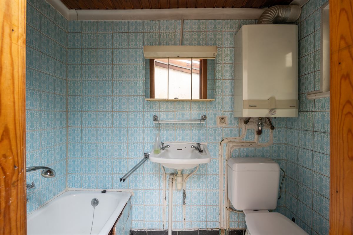 Te renoveren woning met tuin op toplocatie in Mechelen