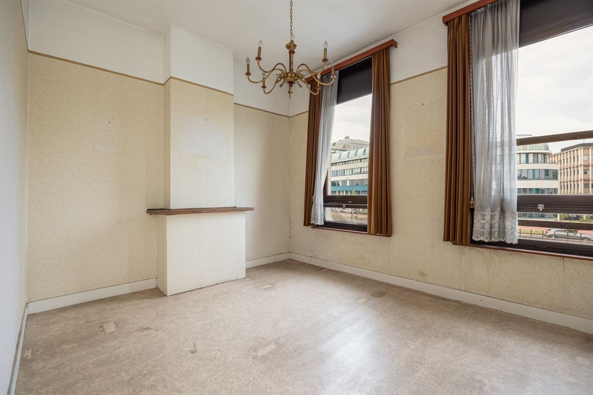 Te renoveren woning met tuin op toplocatie in Mechelen