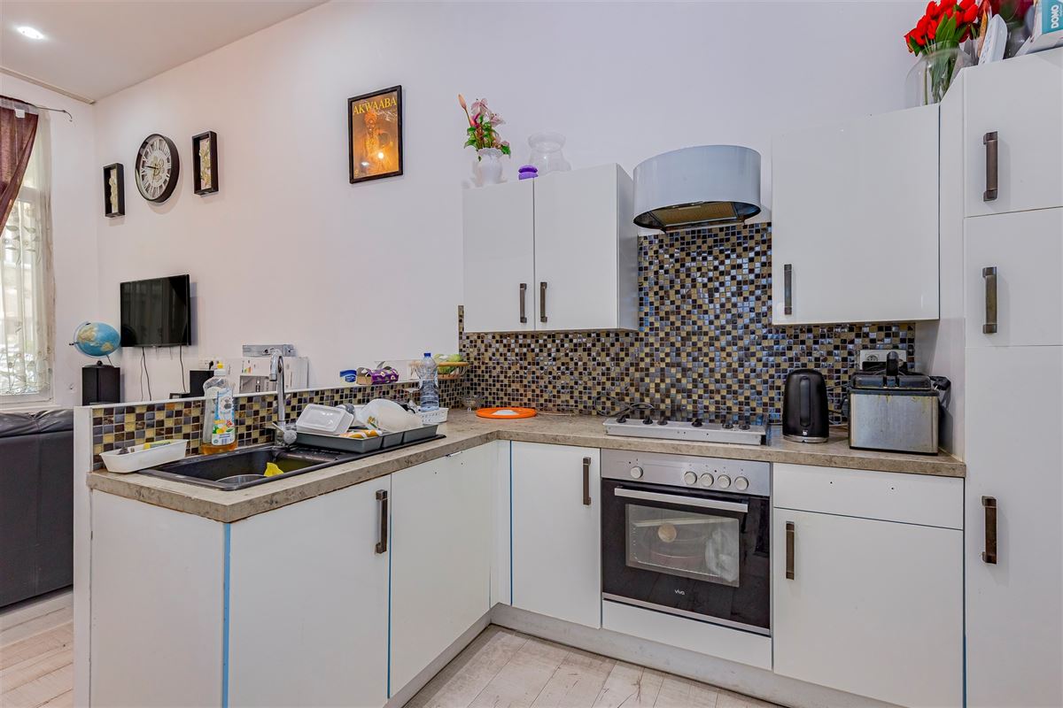 Woning opgedeeld in 4 verhuurde appartementen