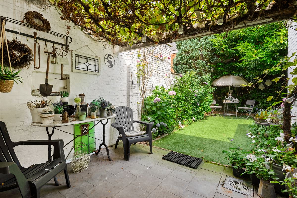 Gezellige rijwoning met 4 slpks en tuin.