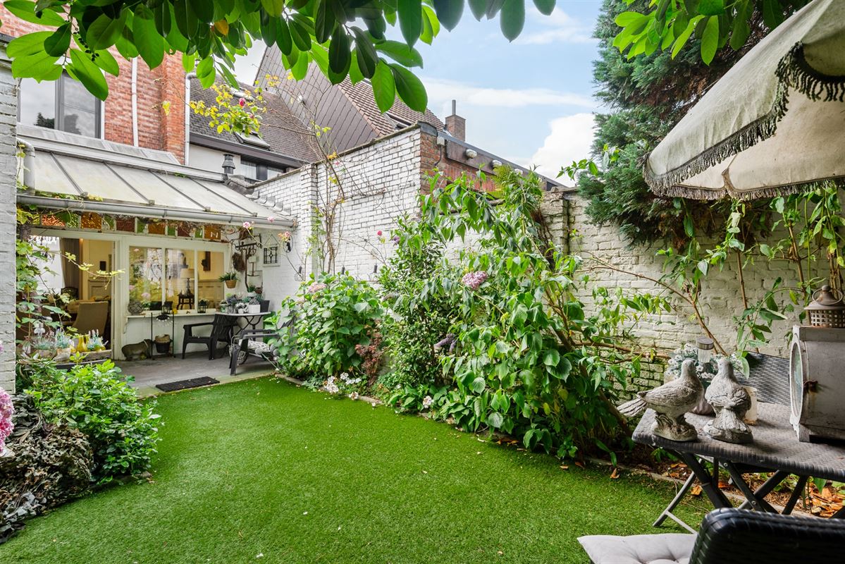 Gezellige rijwoning met 4 slpks en tuin.