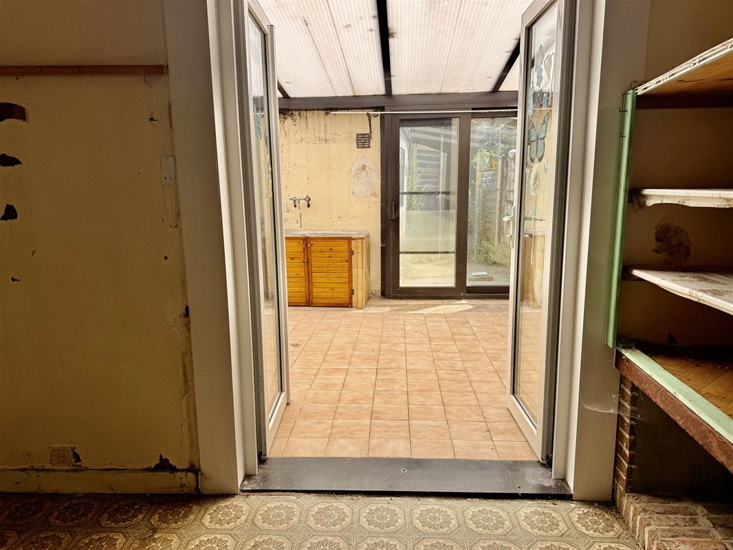 Te renoveren woning op ruim perceel van 440 m².