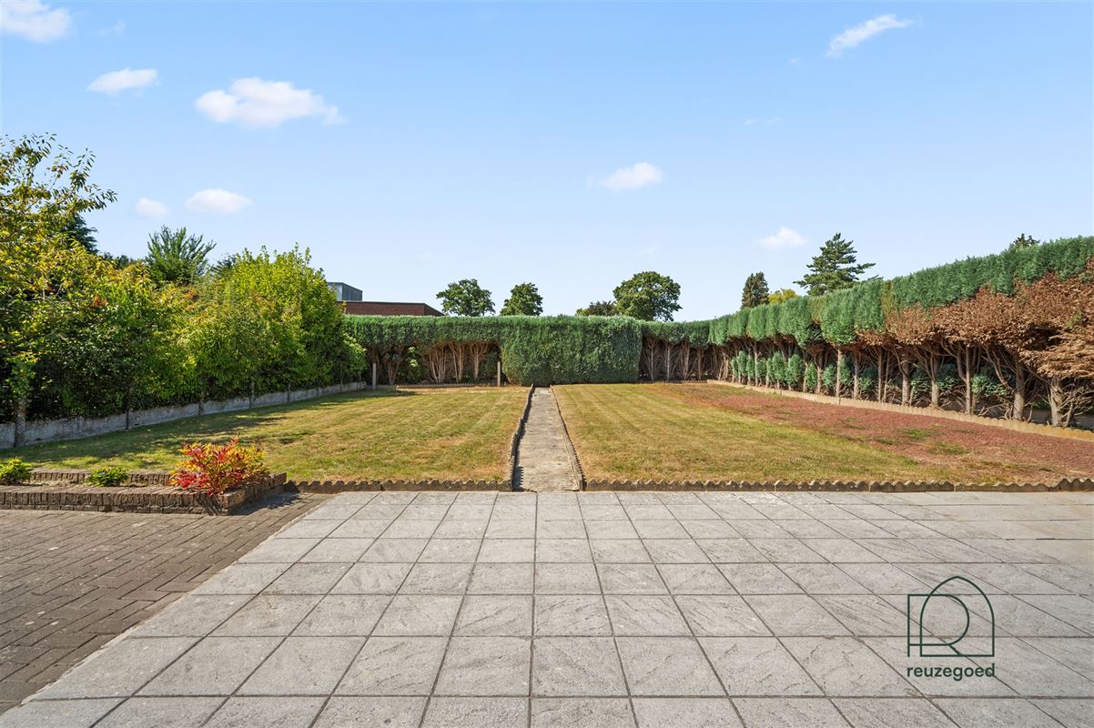 Charmante gelijkvloerse villa in Korbeek-Lo met ruime tuin en onderkeldering