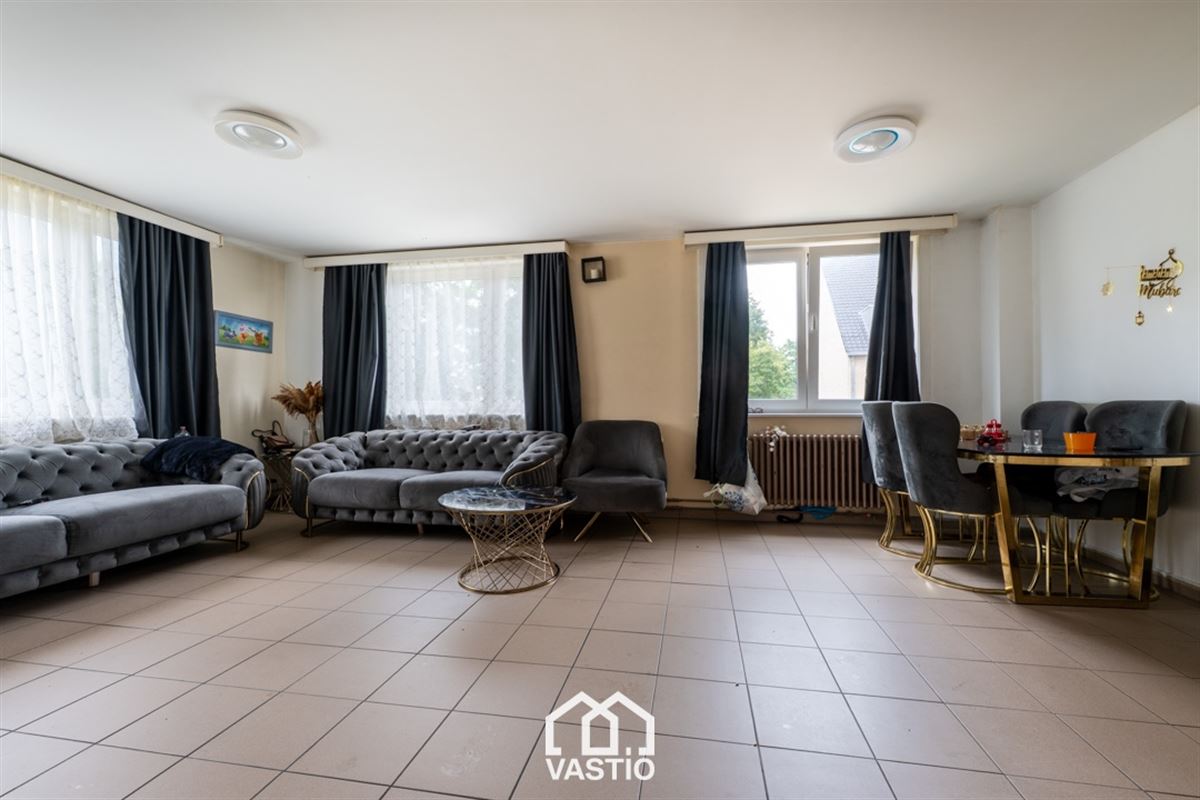 Uniek pand met praktijk en duplexappartement in Gent