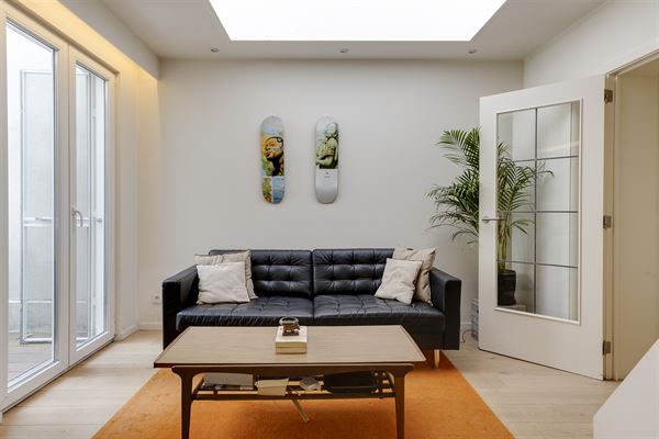 Cozy gelijkvloers appartement met stadskoer
