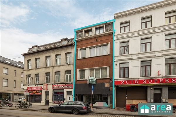 Handelswoning gelegen op een centrale en commerciële locatie!