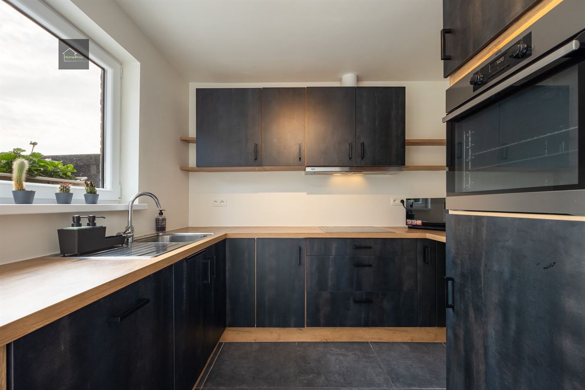 Gelijkvloers appartement met zeer grote tuin