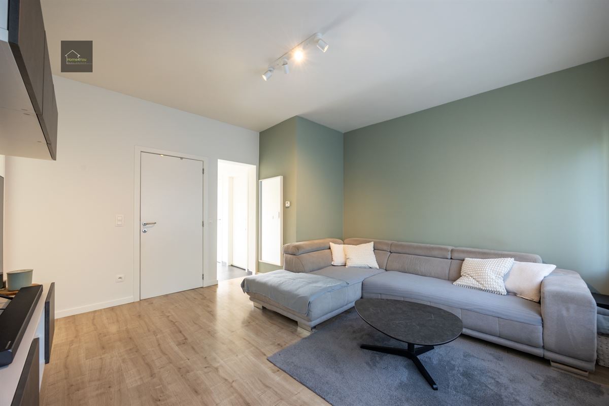 Gelijkvloers appartement met zeer grote tuin