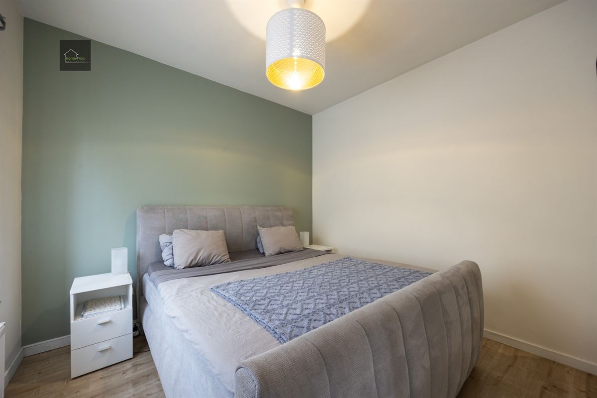 Gelijkvloers appartement met zeer grote tuin