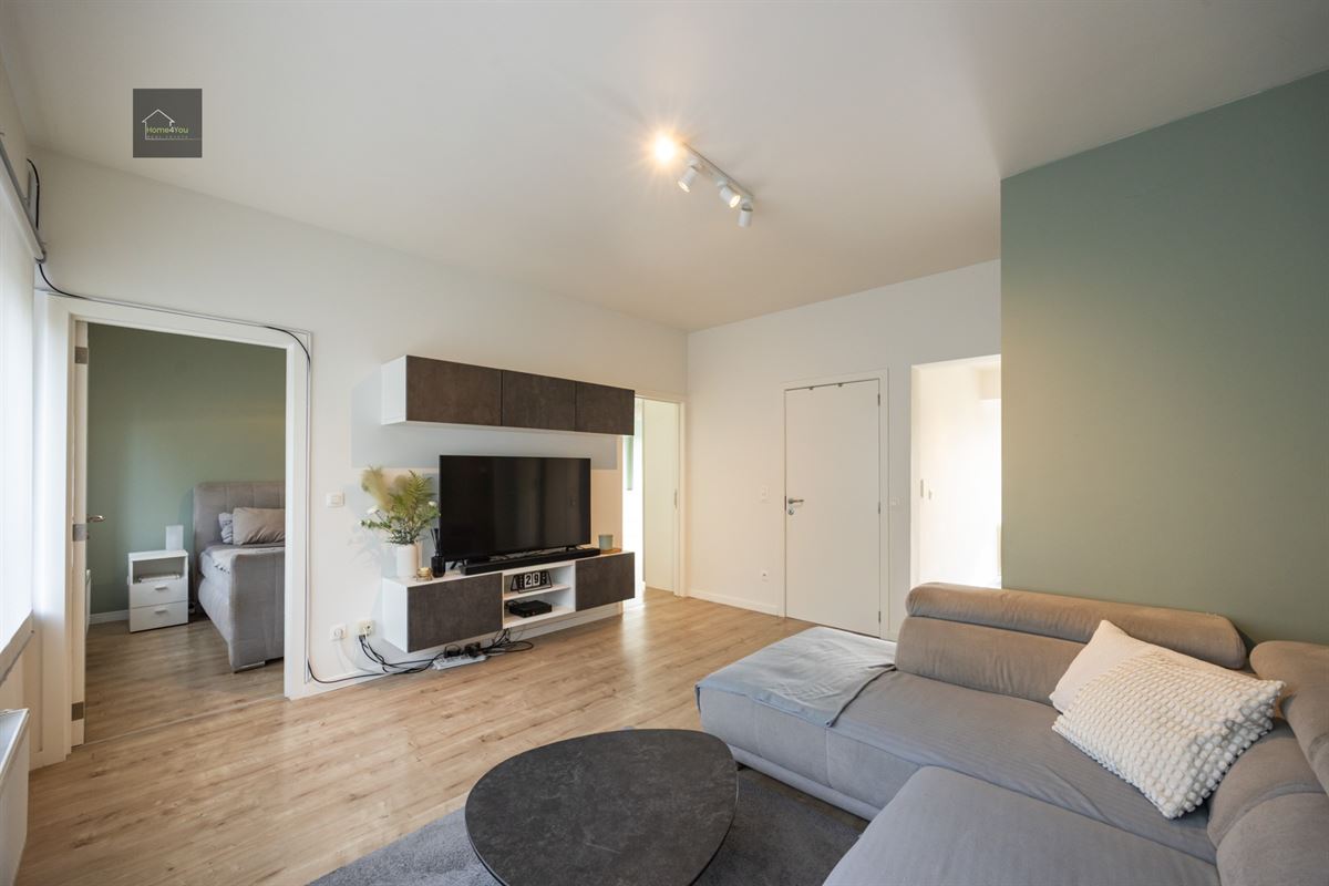 Gelijkvloers appartement met zeer grote tuin