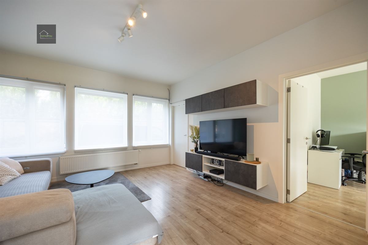 Gelijkvloers appartement met zeer grote tuin