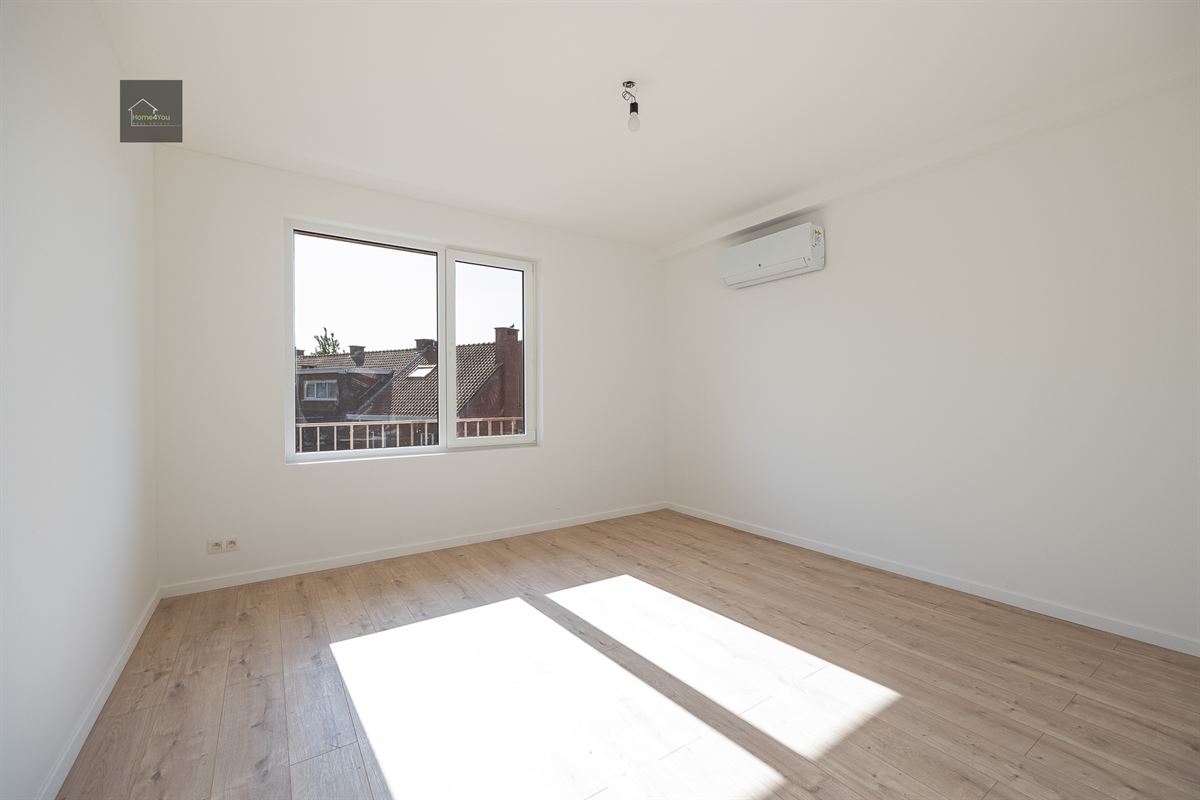 Gerenoveerd appartement met zonnepanelen in kleinschalige blok