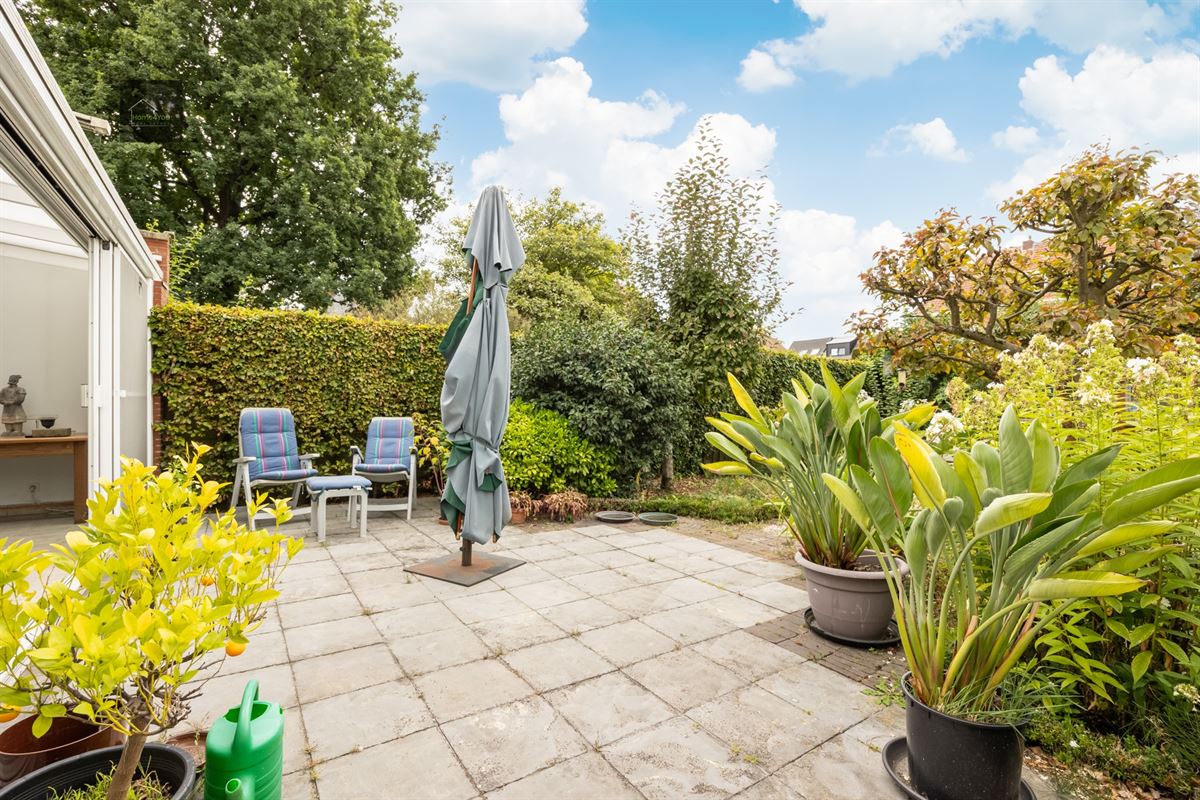 Halfopen bebouwing met tuin en atelier