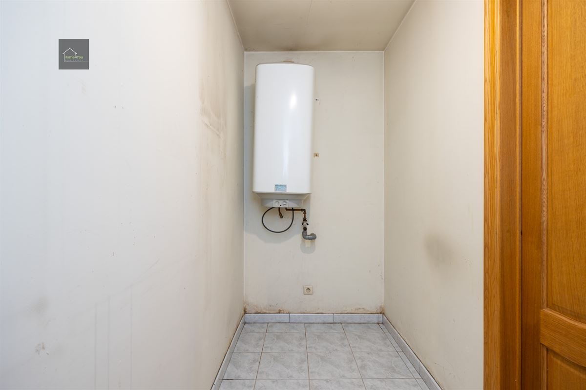 Te renoveren laagbouwvilla met private tuin en garage