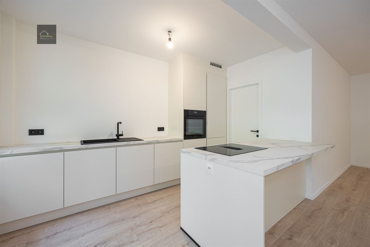 Gerenoveerd appartement met zonnepanelen in kleinschalige blok