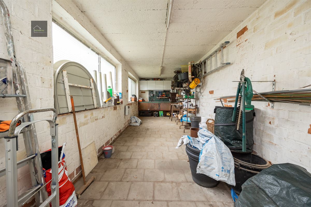 Halfopen bebouwing met tuin en atelier