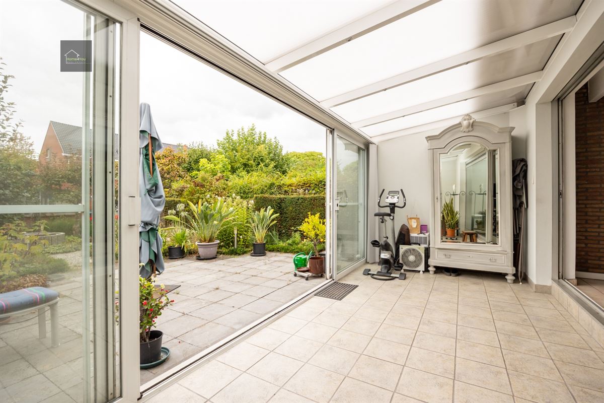 Halfopen bebouwing met tuin en atelier