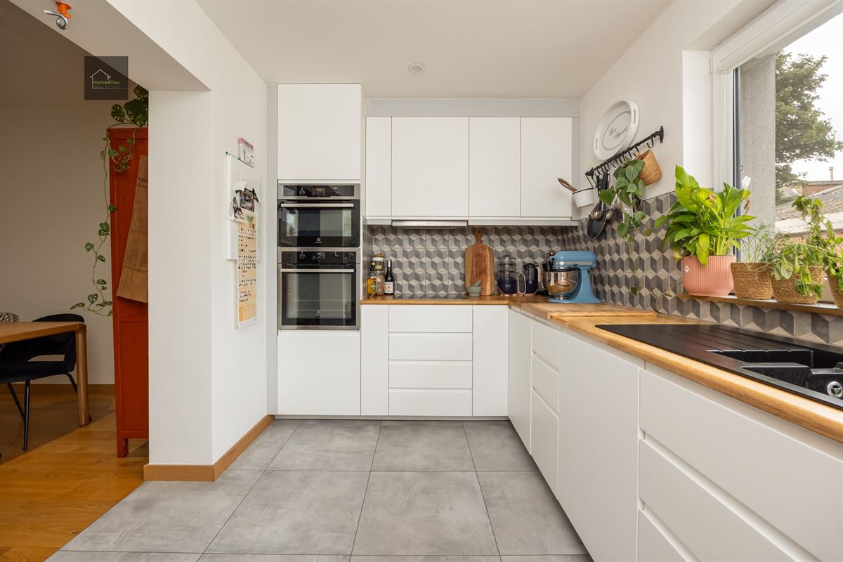 Instapklare woning met garage, oprit en stadstuin in hartje Deurne
