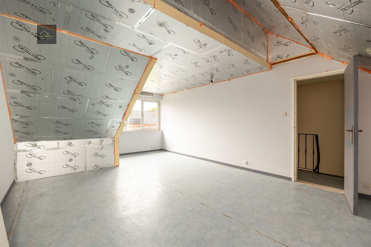 Halfopen bebouwing met tuin en atelier