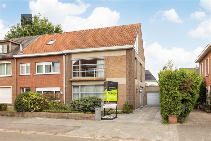 Halfopen bebouwing met tuin en atelier