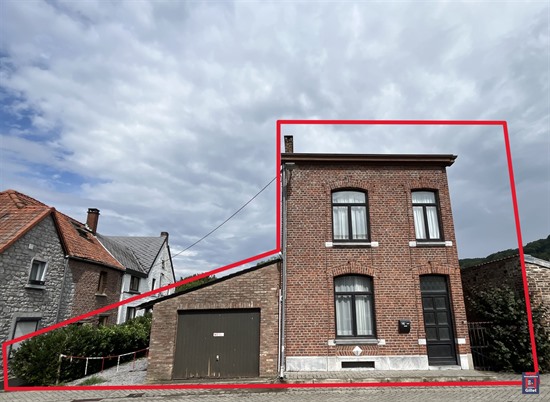 Maison de ville avec garage et spacieux jardin