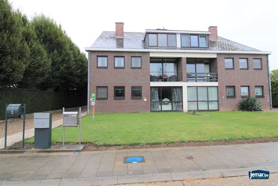 Zeer ruim gelijkvloers instapklaar appartement met garage en tuin op de rand van het centrum van Maaseik!
