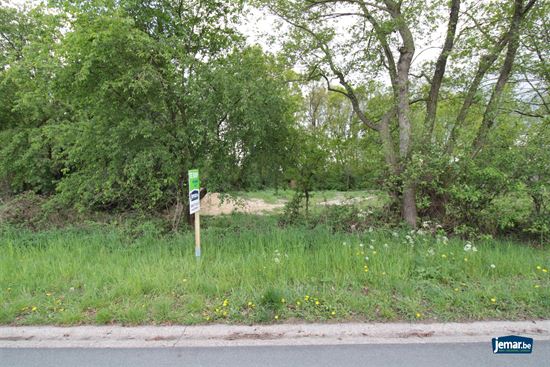 Rustig gelegen perceel bouwgrond open bebouwing vlakbij het centrum van Neeroeteren